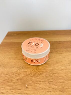Shea Moisture Kids Curling Coconut Butter Cream - Peach Colored Jar